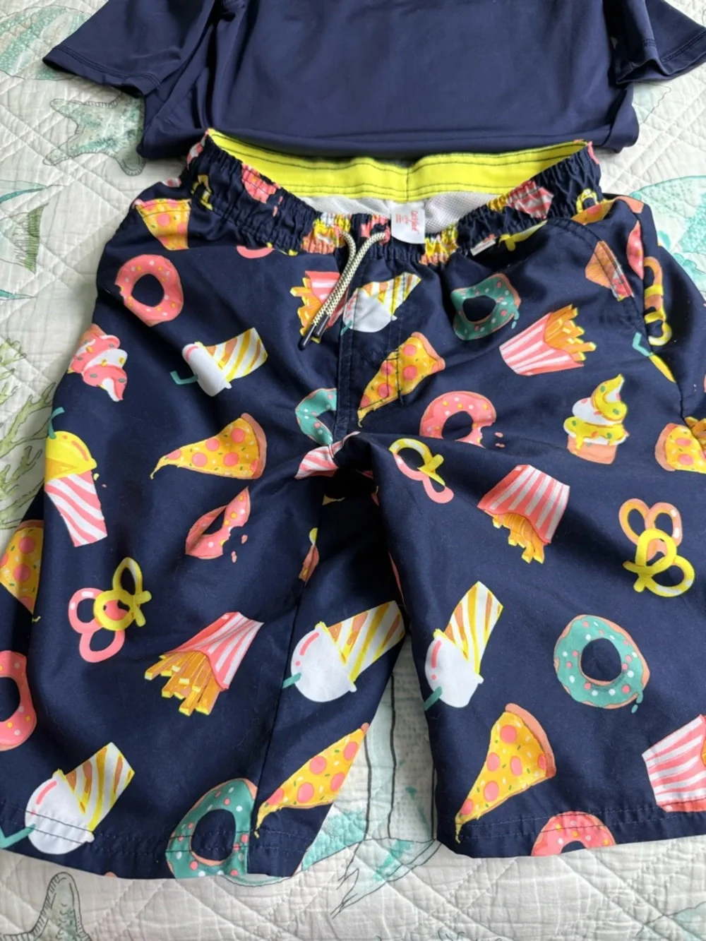 Kids large Navy Cat & Jack Rashguard and large Cat & Jack snack swim trunks